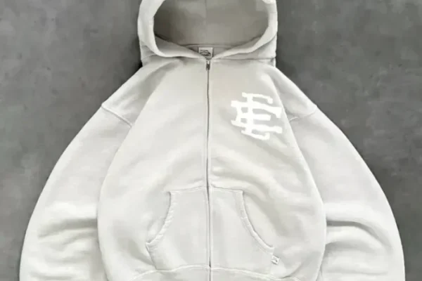 1 / 1 – ERIC-EMANUEL-x-AKIMBO-x-TYRRELL-WINSTON-ZIP-UP-HEATHER-GREY