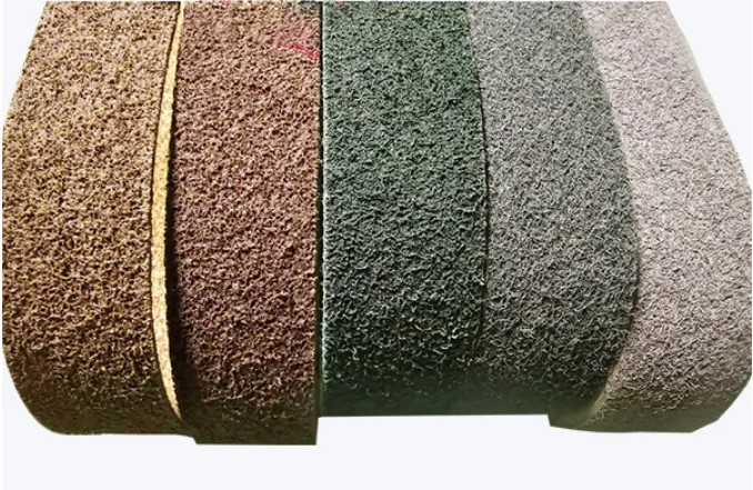 Non-woven abrasive pads